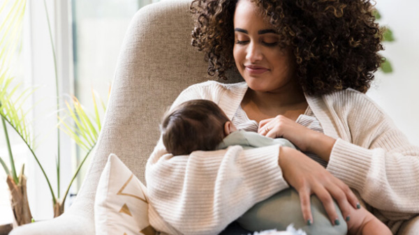 Mother breastfeeding her baby.