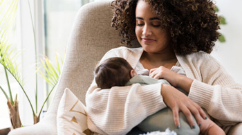 Mother breastfeeding her baby.