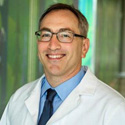 Headshot of David Suskind.
